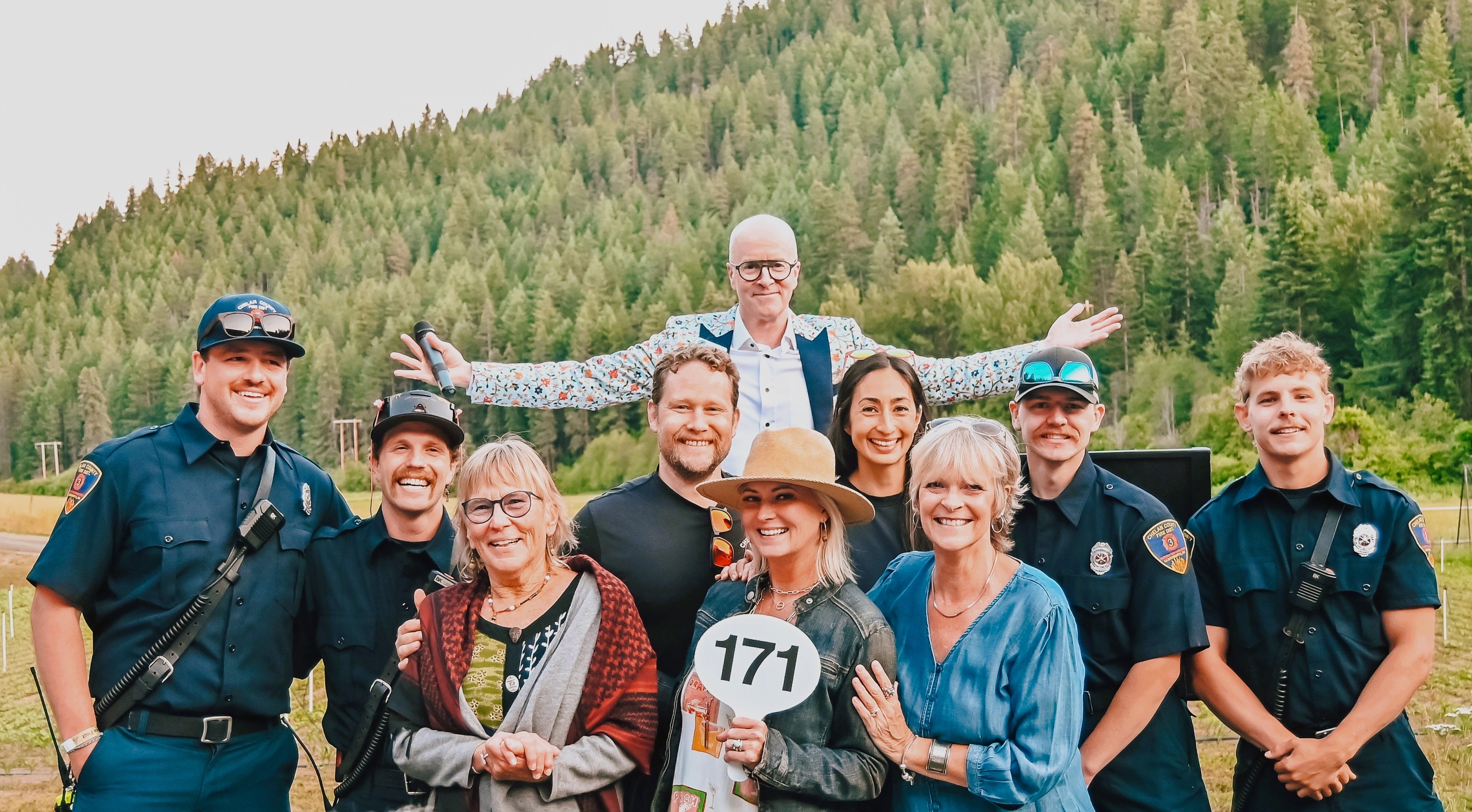 Fire fighters and auctioneer